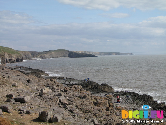 SX03548 Seafishing from rocks by Ogmore by sea